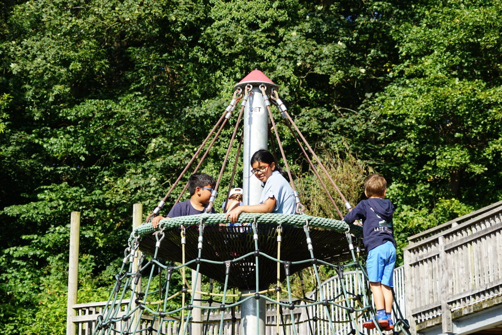 a picture ofchildren enjoying the outdoor playground at Nell Bank outdoor education centre