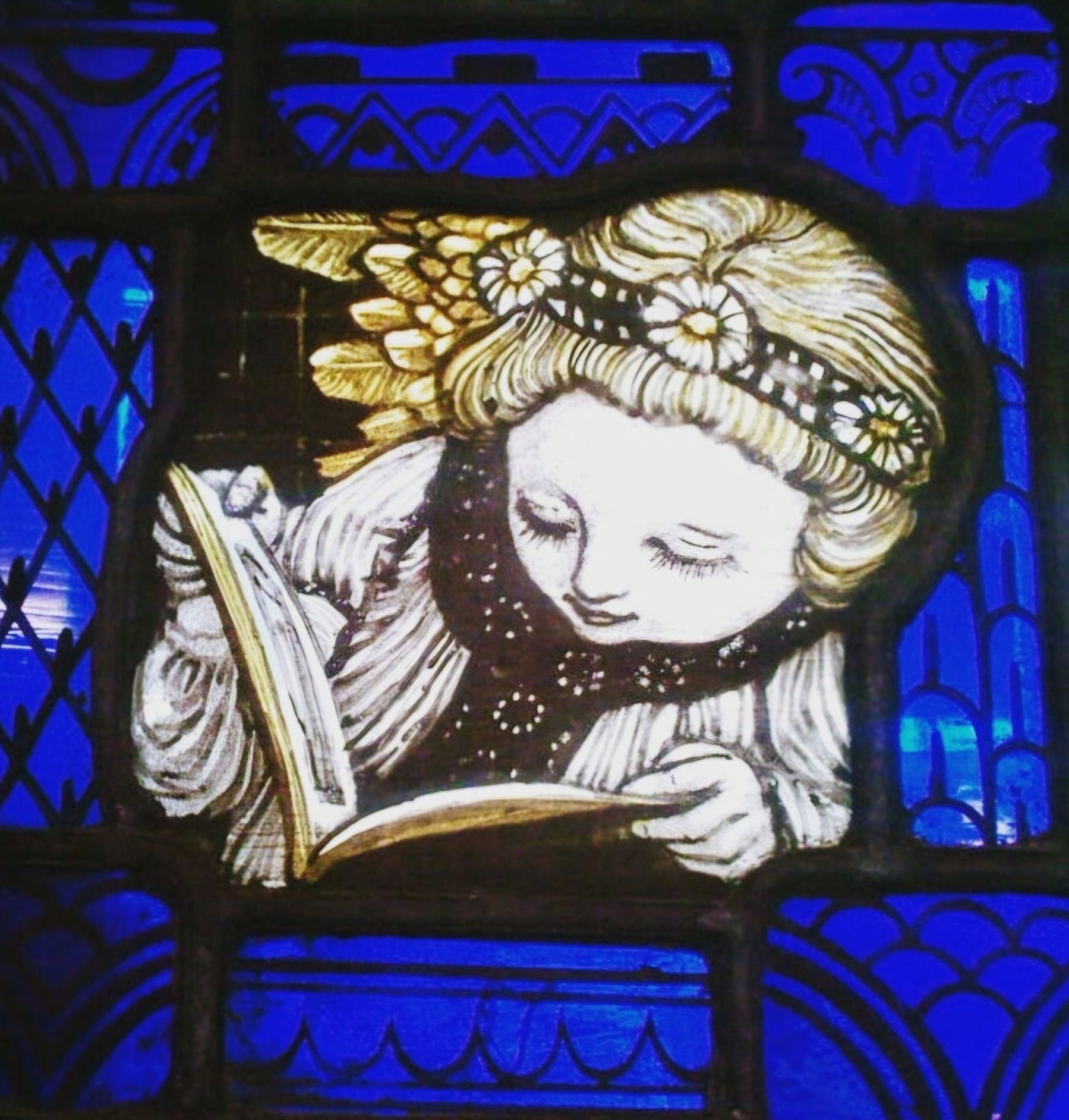 stained glass detail stained glass window detail by Norman MacDougall (1852–1939) born in Glasgow, studied at the Glasgow School of Art and joined the Guthrie Studio in 1887 after living in London and working with noted stained glass artist Daniel Cottier.