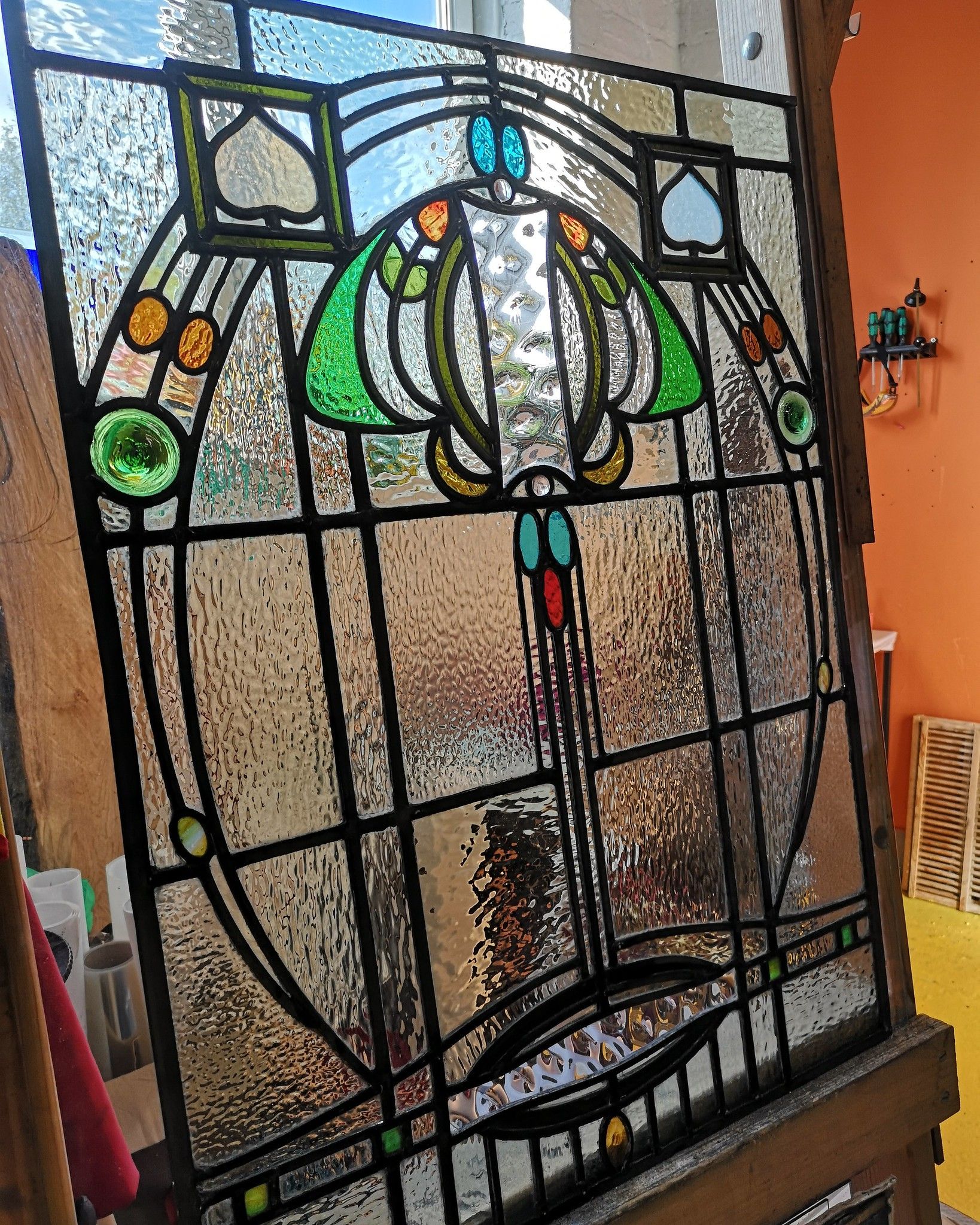 arts and crafts styled stained glass window possibly  george walton / e.a. taylor.