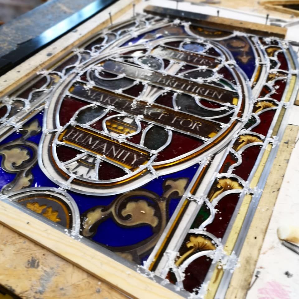 soldering a stained glass panel