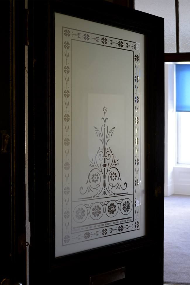 Edwardian etched glass window for tenement flat entrance Glasgow