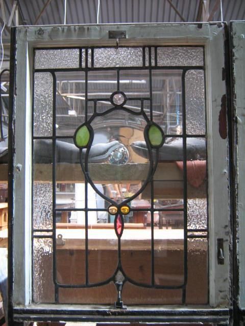 Glasgow architectural salvage leaded glass windows resized for new kitchen doors and a large transom leadlight