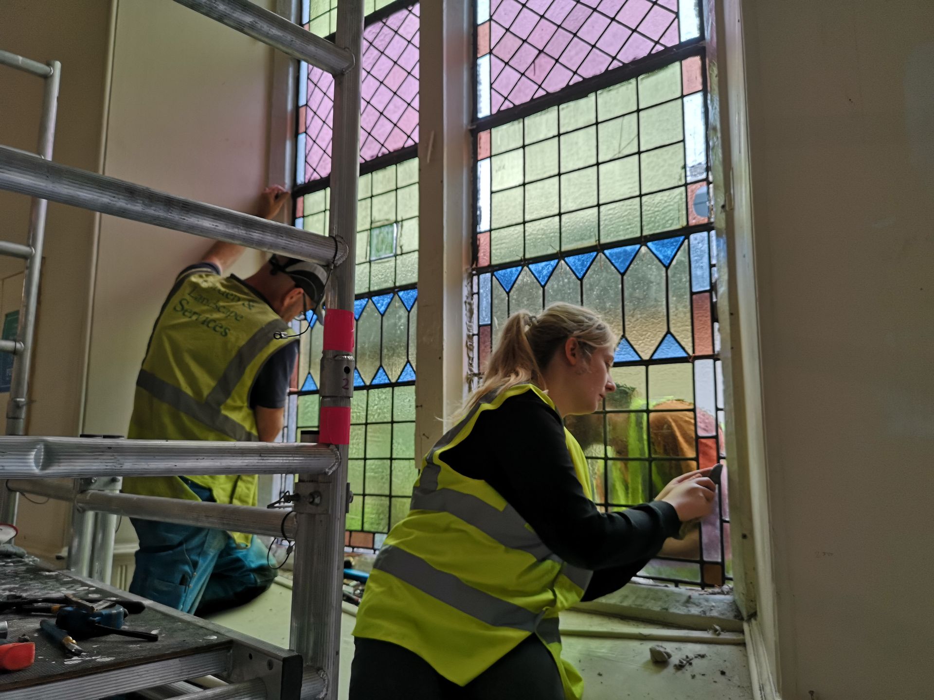 repairing a church stained glass window