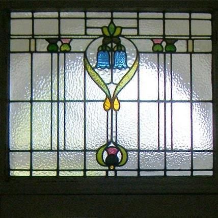 Thistle design stained glass window