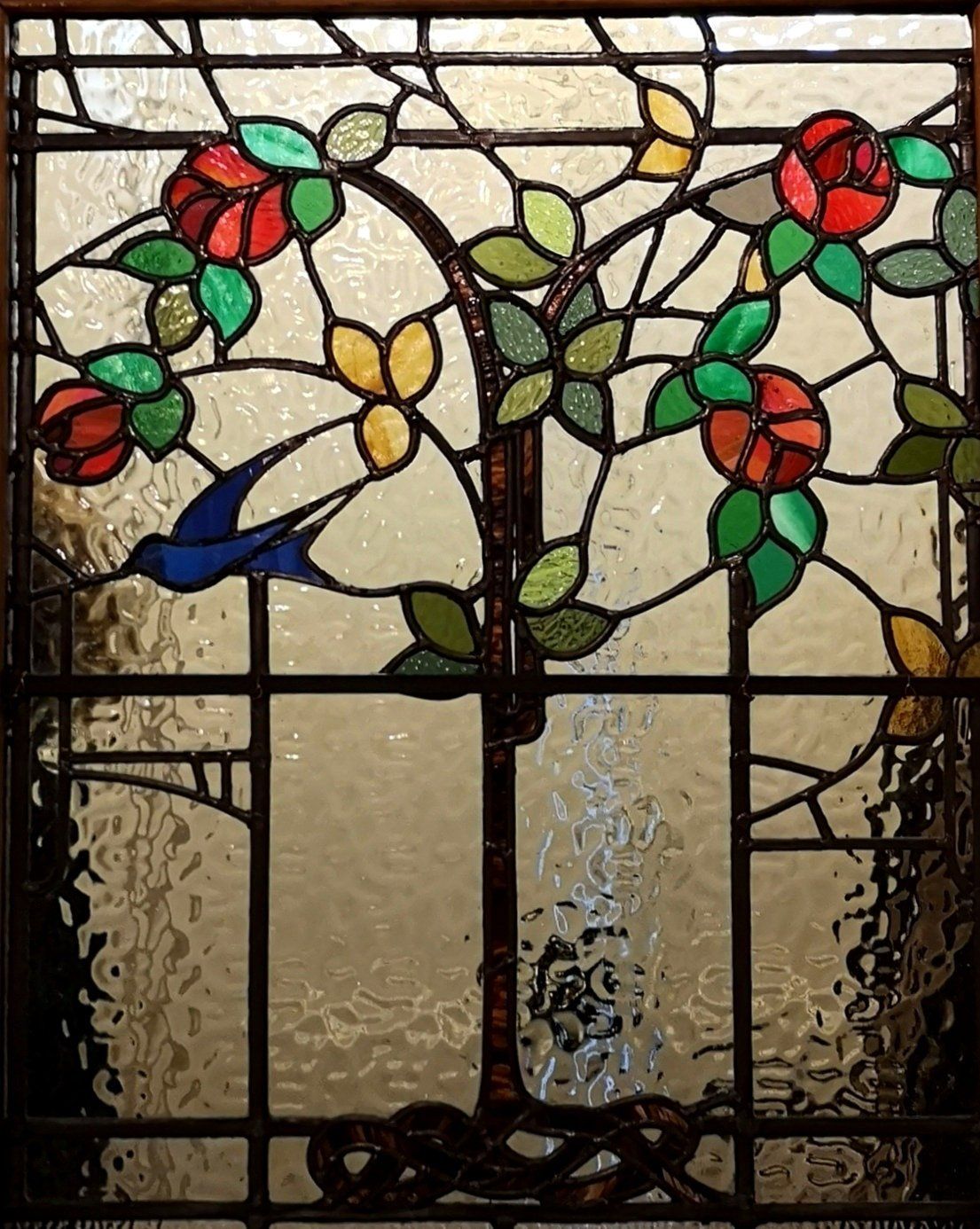 swallow stained glass window