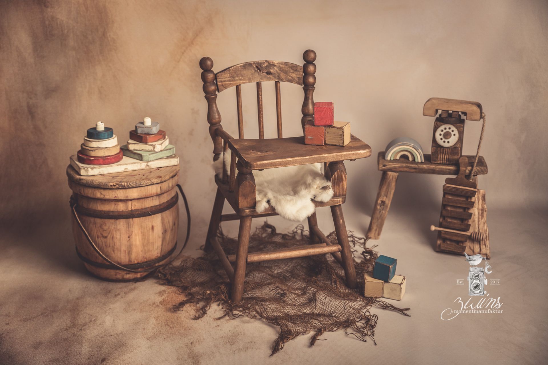 Babyfotoshooting in Henstedt-Ulzburg im Fotoset mit Hochstuhl