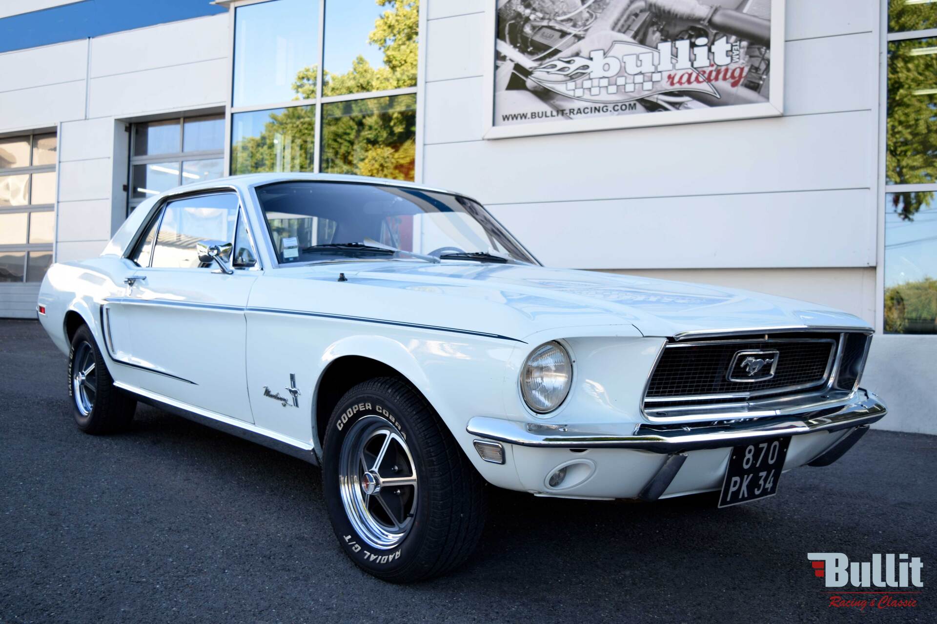 FORD Mustang coupé 302 code J boîte 4 - 1968, vue de 3/4 avant droit