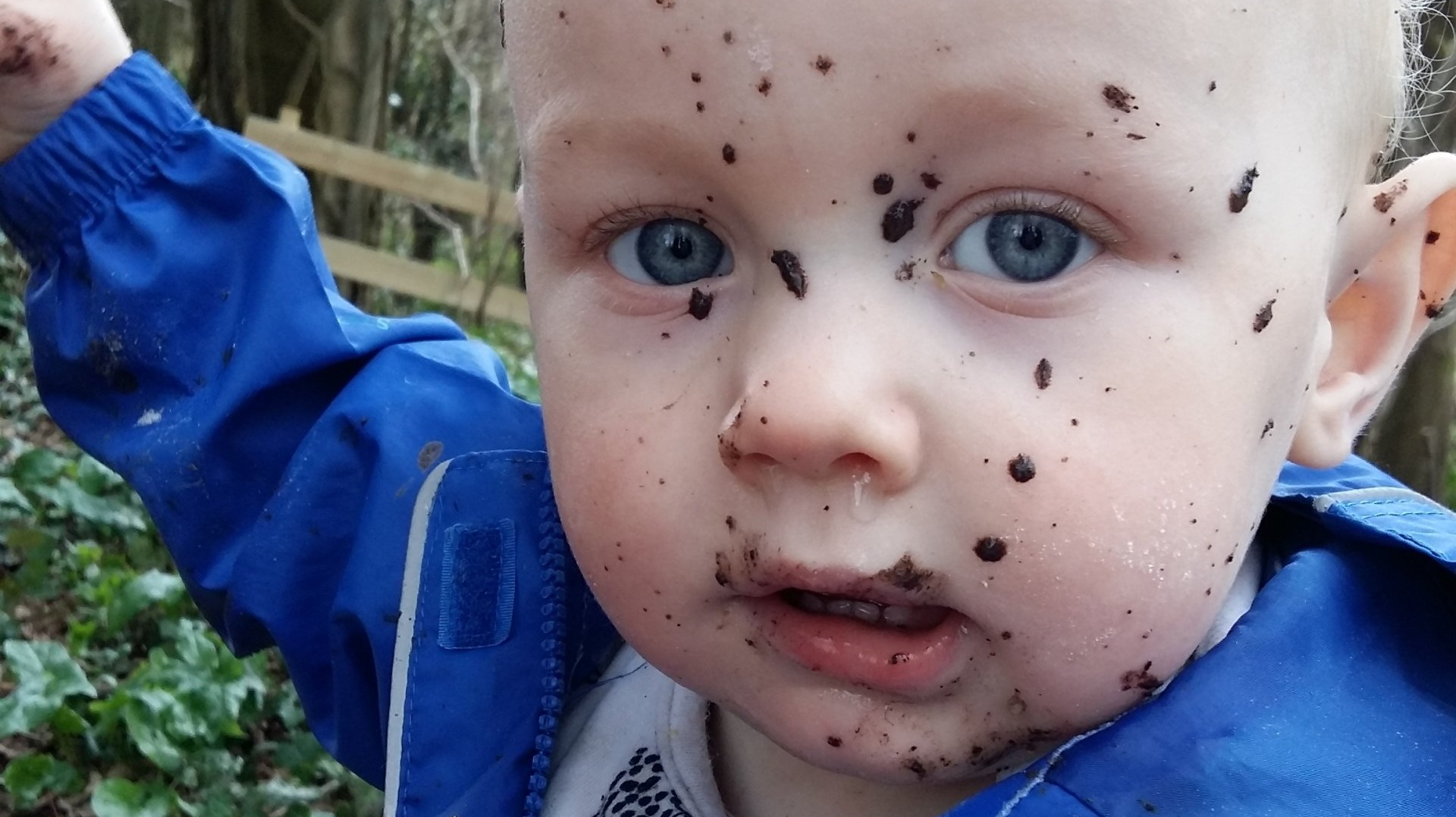 Toddler with a muddy face