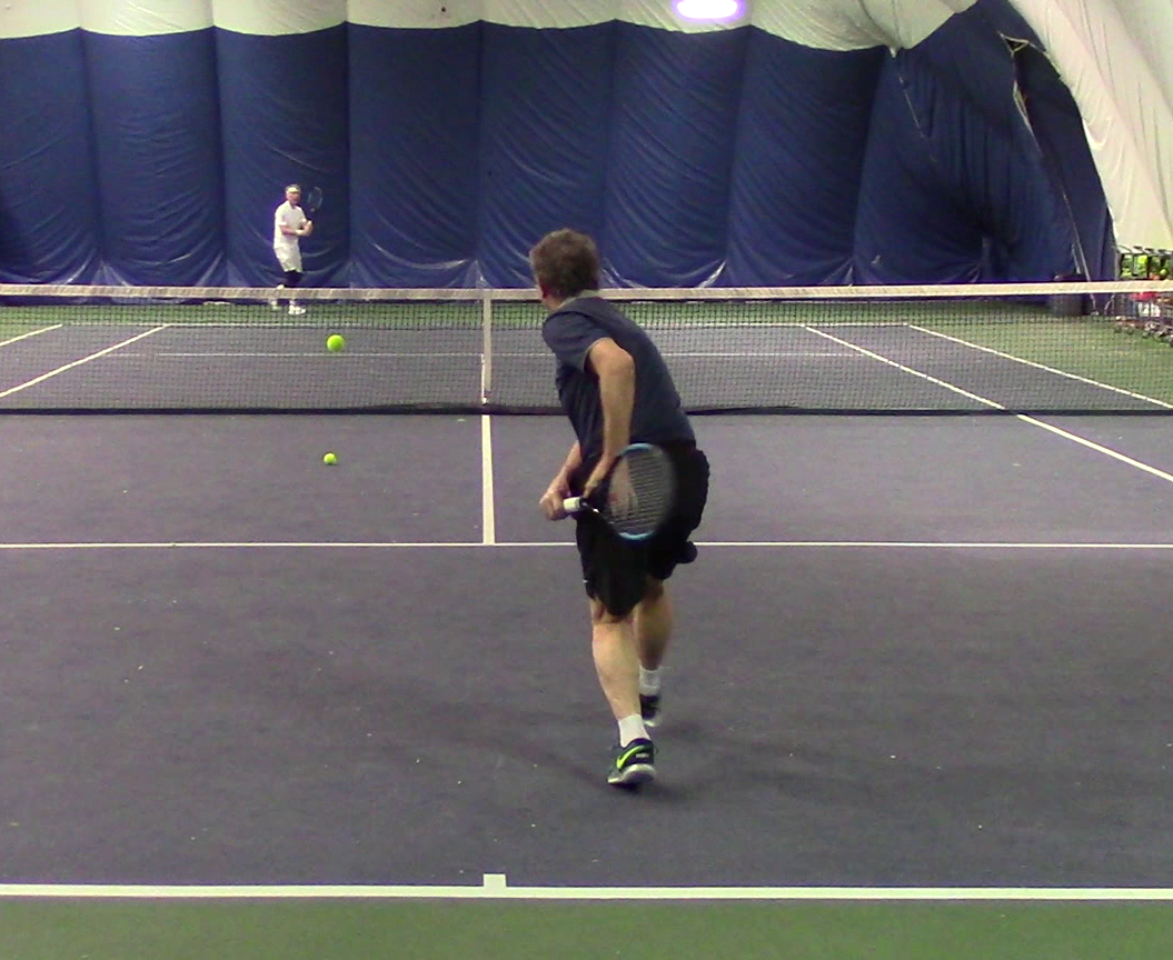 Player hitting backhand
