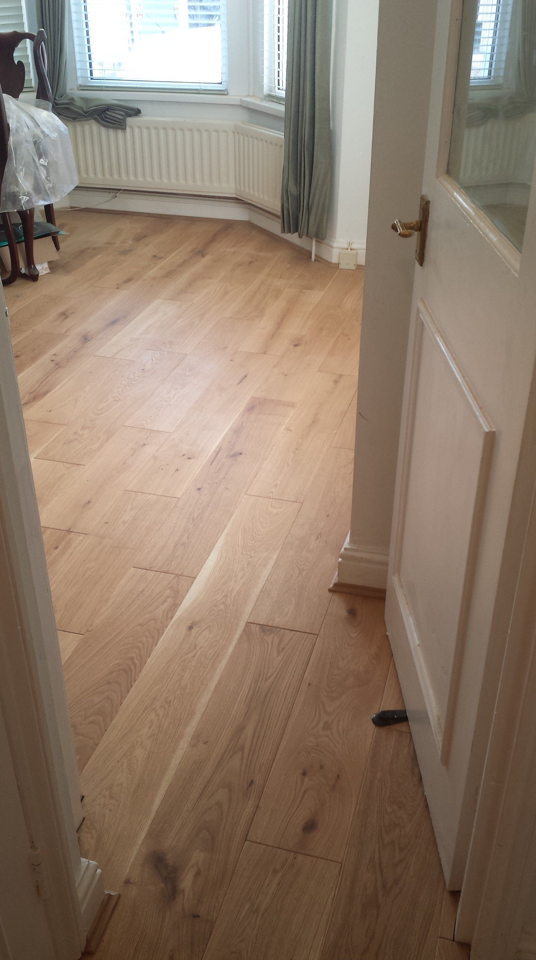 Oak flooring installed in a bedroom in Windsor.
