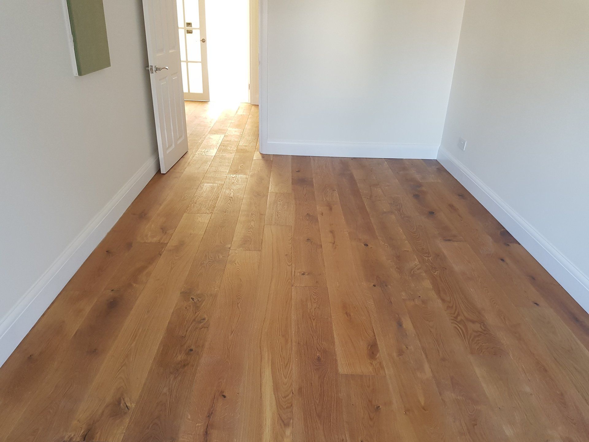 Oak flooring installed.Custom woodwork in Staines and Old Windsor, near Windsor, offering tailored carpentry and joinery.