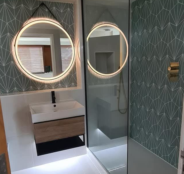 Modern bathroom installation in Windsor with tiled walls and walk-in shower