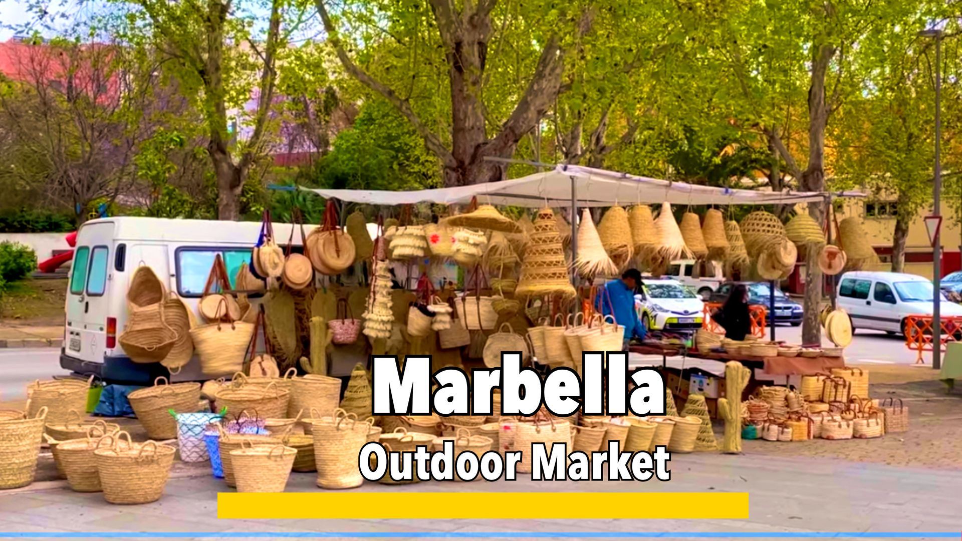 Marbella outdoor market, offering a variety of fresh produce, local goods, clothing, and crafts in a vibrant, open-air setting