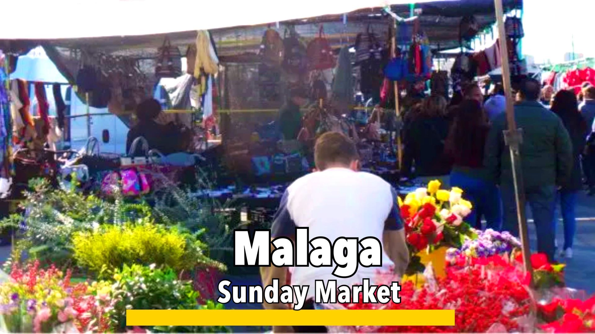 Málaga’s Sunday market, bustling with stalls offering local produce, crafts, antiques, and traditional Spanish goods