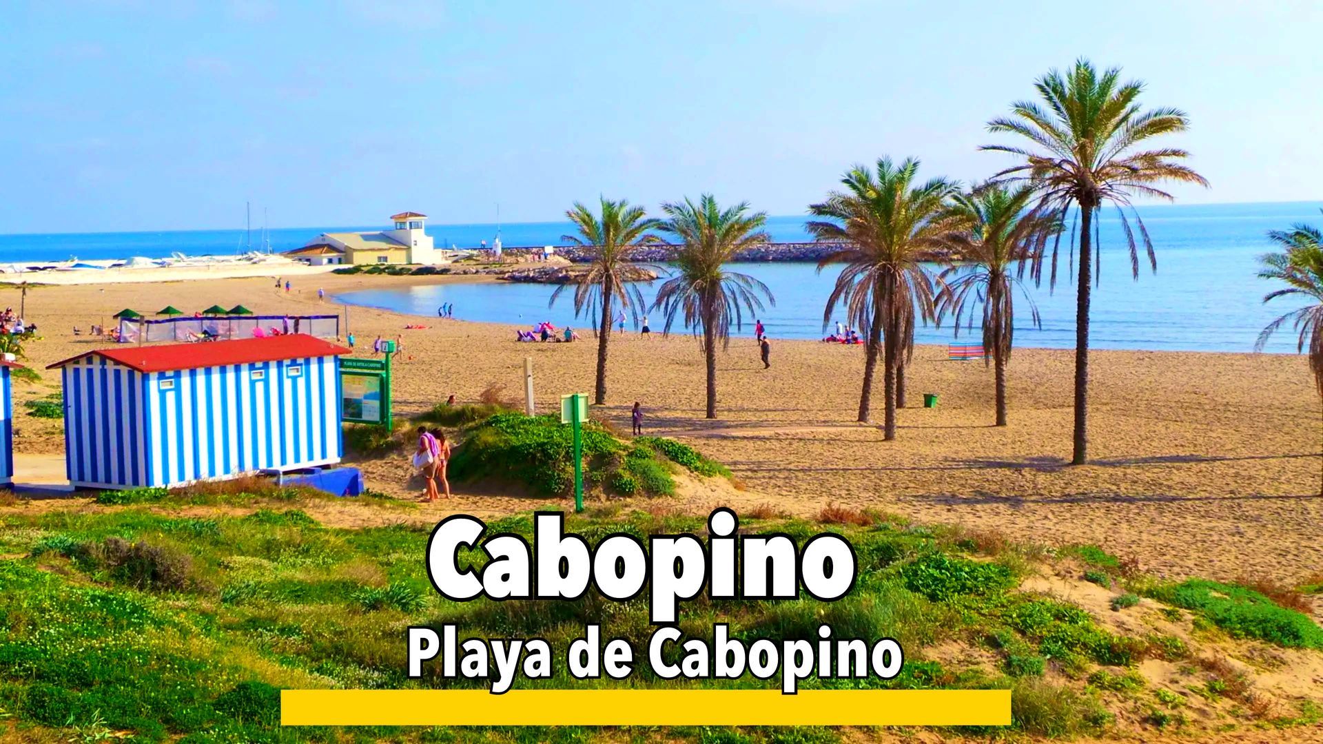 Cabopino Beaches near Marbella, featuring golden sands, clear waters, and a relaxed atmosphere surrounded by dunes and natural beauty