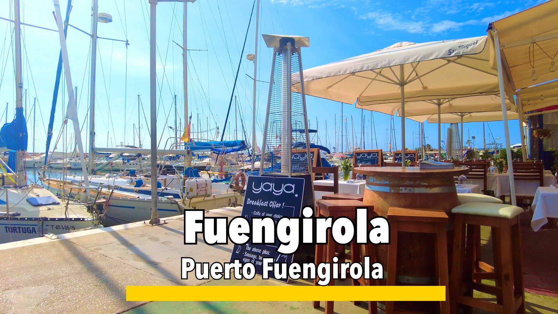 View of Puerto Fuengirola marina with boats and waterfront dining, a popular attraction in Fuengirola, Costa del Sol