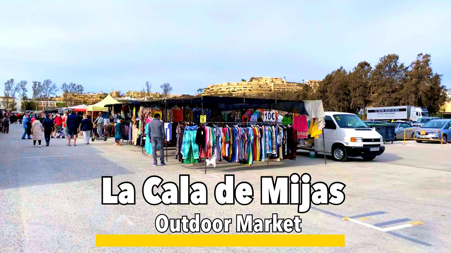 Outdoor markets in La Cala de Mijas, featuring stalls with fresh produce, handmade crafts, clothing, and local goods in a lively setting