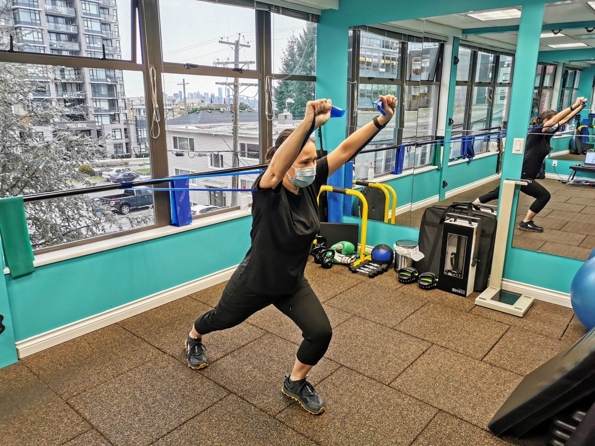 Caroline training her upper body endurance! Young Woman Band Press Exercise