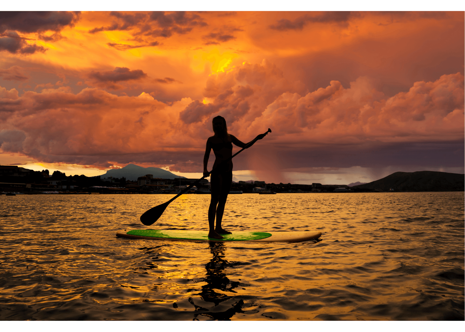 Stand-Up Paddle Boarding stand up paddle boarding at sunset