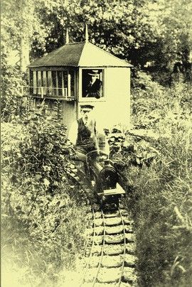 Guy Mitchell indulged the girls and their friends, so I had many rides on the railway, and lazy afternoons in the boat on the lake. It all seemed on such a grand scale to our small eyes, but I believe that the railway was indeed quite extensive. I remember that one came out of a short tunnel straight into a station, just like arriving at Grindleford after the Totley tunnel. It was indeed complete with railway equipment as your report.   They bought a Belsize 12/14 2-seater car, a popular model by the standard of 1913. Guy couldn't drive, much less swing-start it, so his enterprising wife learned both to start it by hand and to drive, a not too common accomplishment in those days.