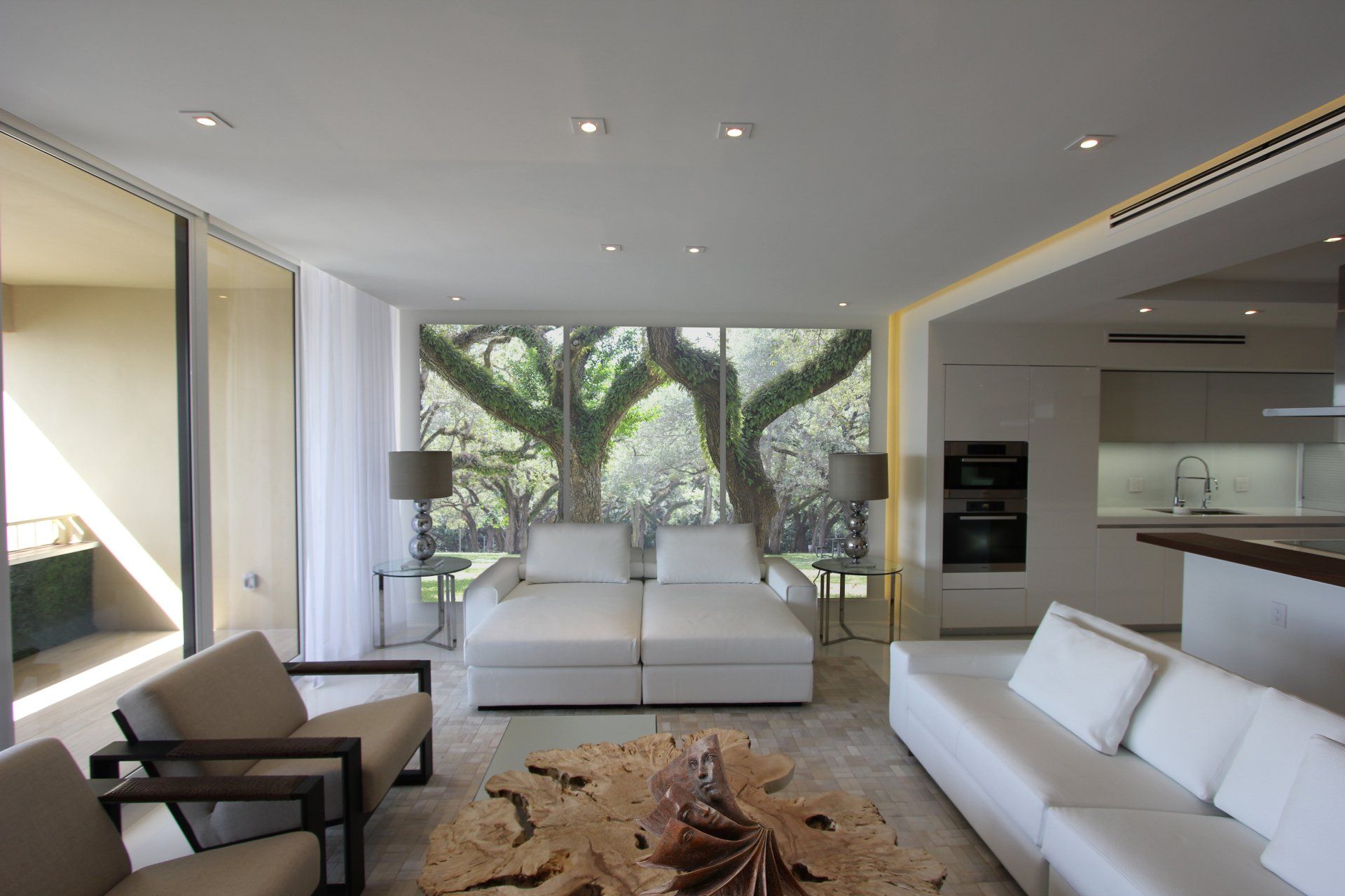 Remodeling penthouse with an organic contemporary style. Natural finishes are combined to create a nature atmosphere.