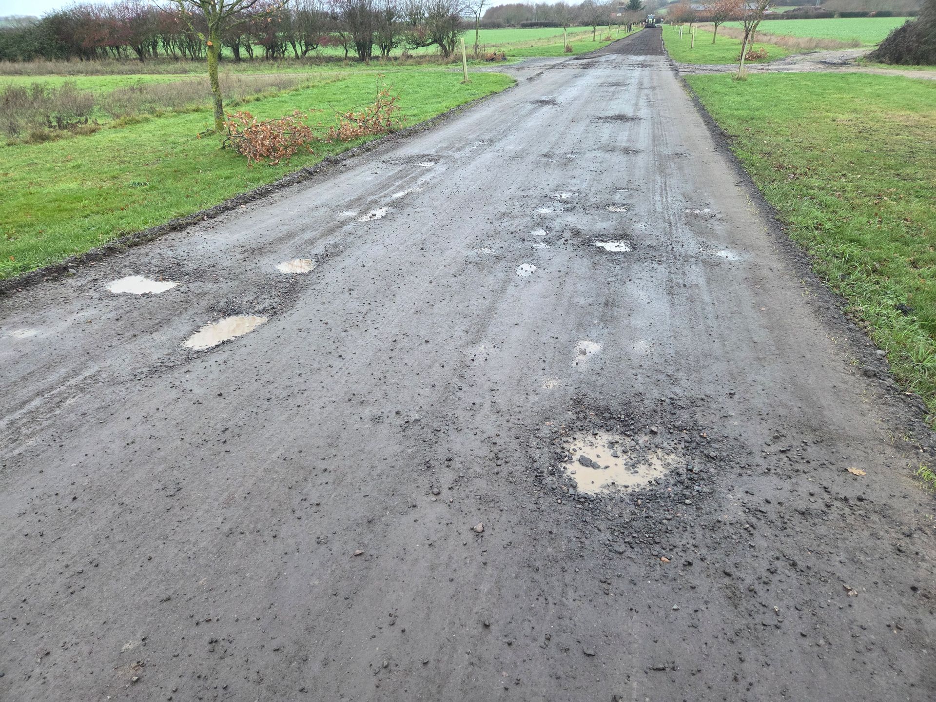 farm track grading/filling potholes