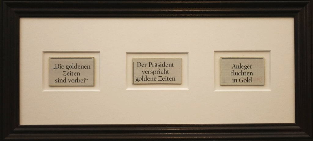 Wortcollage aus Tagesspiegel-Schlagzeilen und Zwischentexten in schmalem Rahmen.