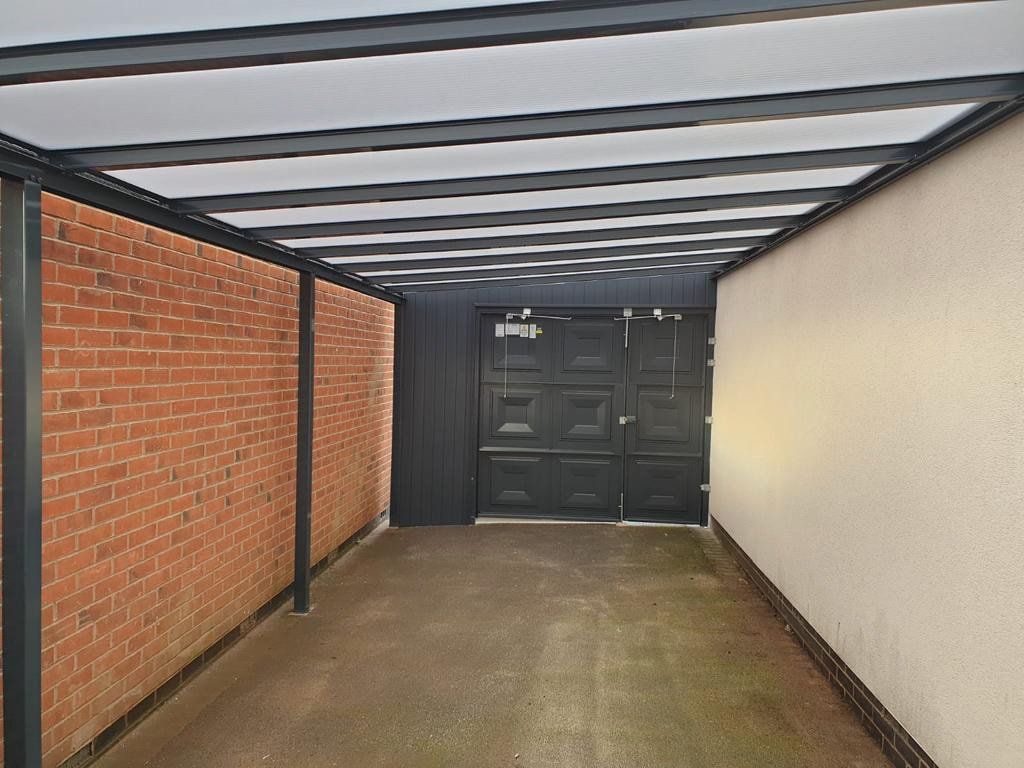 Bridgfords Carport with Garage Door