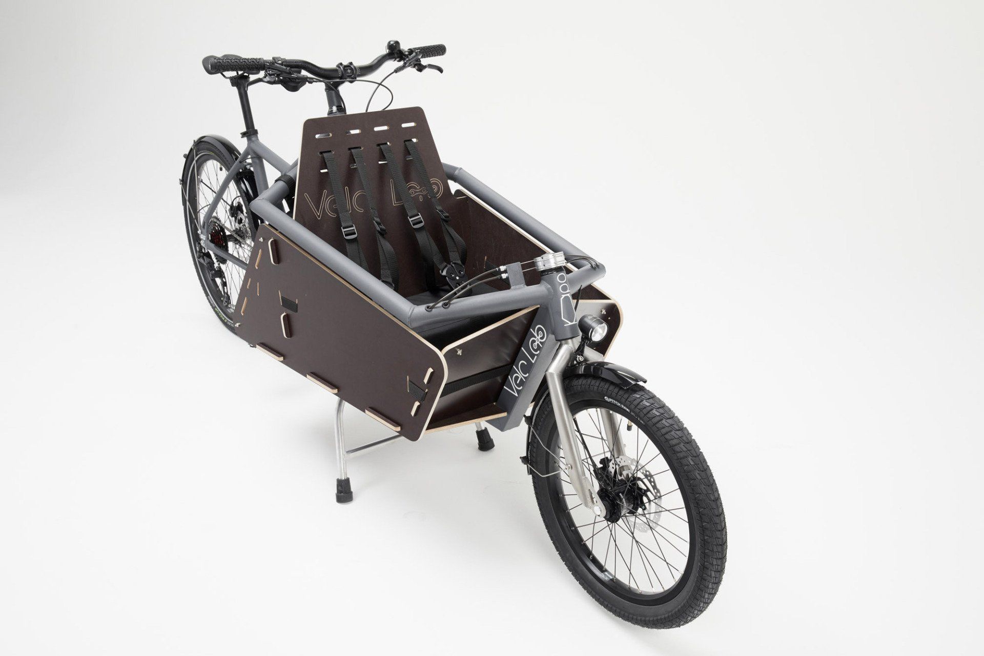 Einspuriges kompakt Lastenrad mit Kindersitzbank und Holzkiste