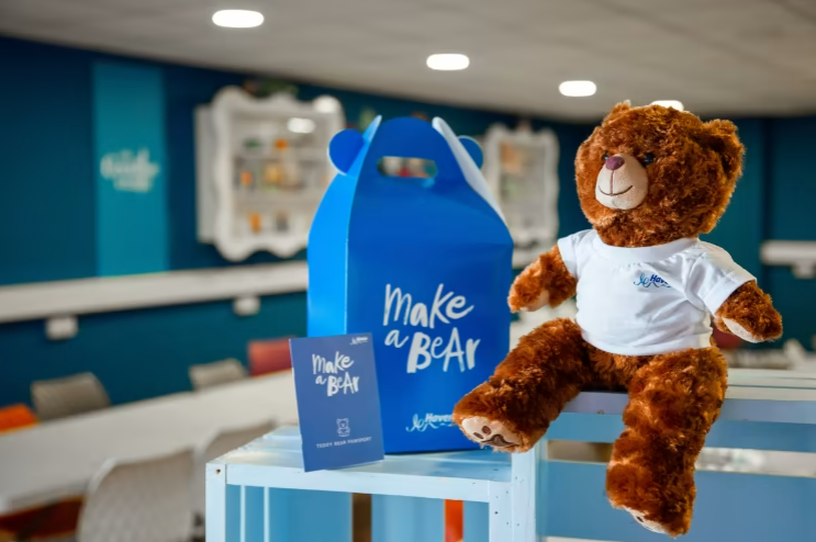 an image of a make a bear box and teddy bear wearing a white tee shirt which can be made at haven
