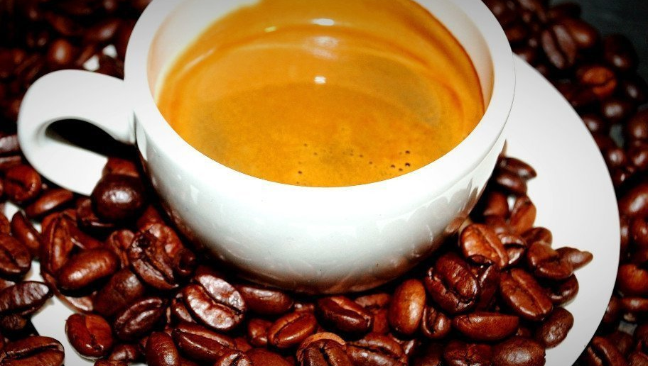 Blend 34 Espresso from Blend 34 Coffee Beans Blend 34 Espresso shown surrounded byBlend 34 Coffee Beans