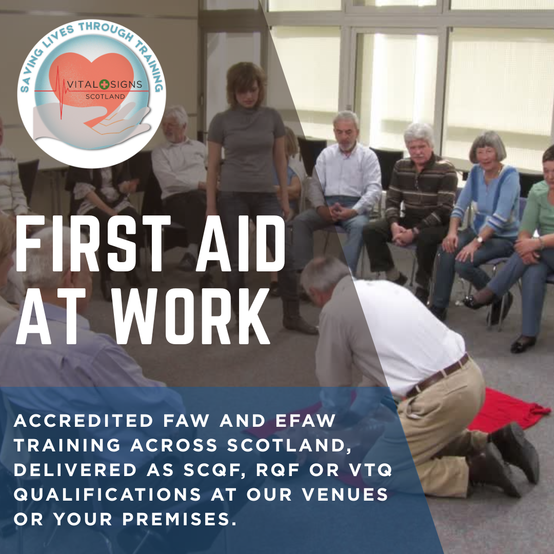 First Aid at Work training session in Scotland with instructor demonstrating CPR during accredited FAW course.