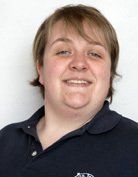 Head and shoulders of a woman with short blonde hair