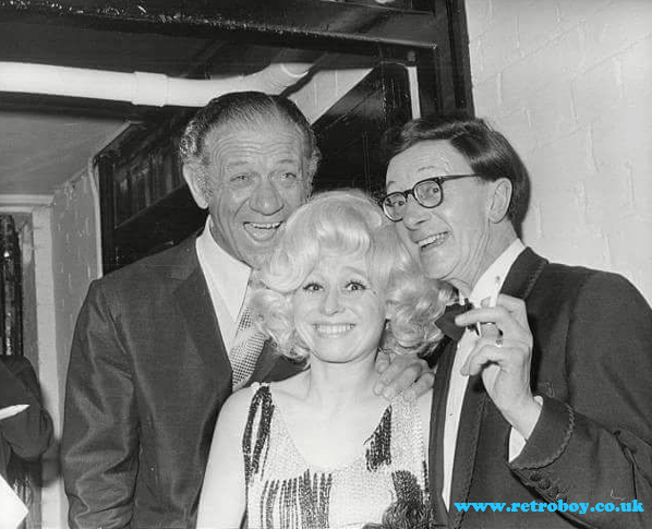 Sid James, Barbara Windsor & Charles Hawtrey together at what looks like a 'wrap party' for one of the 'Carry On' films.