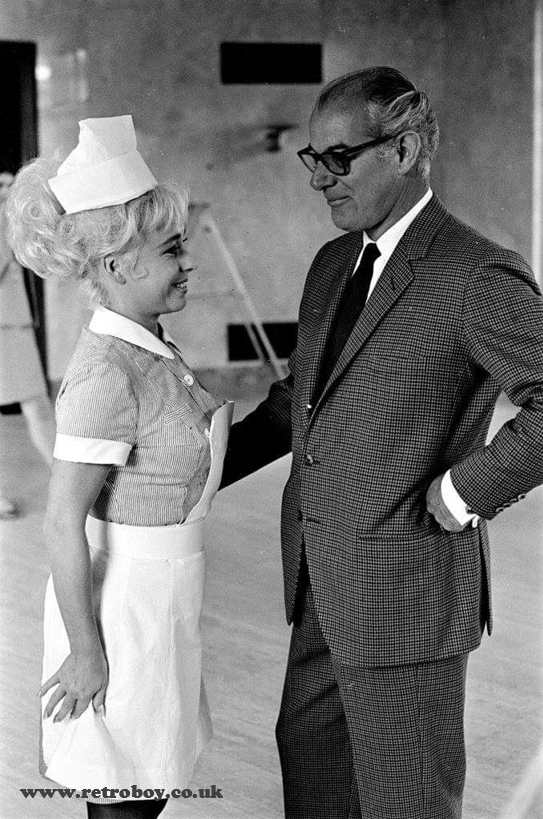 'Carry On' Producer Peter Rogers & Barbara Windsor have a moment of reflection in between takes on the set of 'Carry On Doctor' (1967).