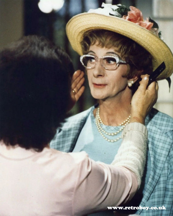 Charles Hawtrey proving life's a 'drag' as he gets a 'touch up' on the set of 'Carry On Again Doctor' (1969).