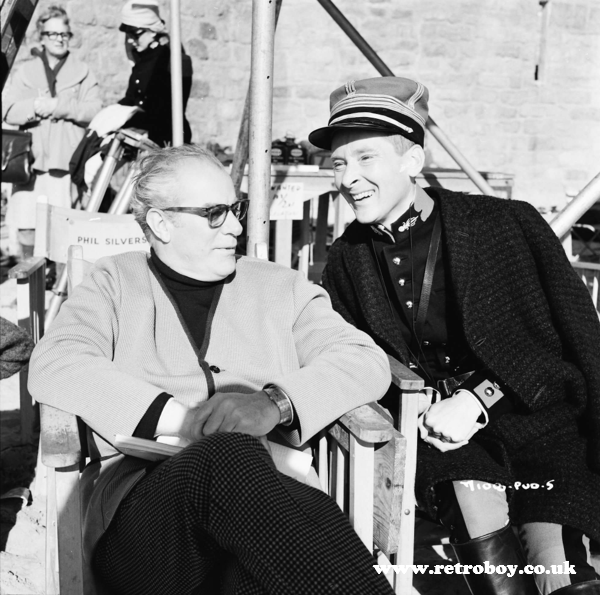 Peter Rogers & Kenneth Williams having a chat between takes on 'Carry On Follow That Camel' (1967).