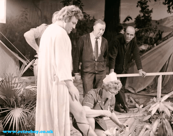 Terry Scott receiving some first aid to his foot on the set of 'Carry On Up the Jungle' (1970)
