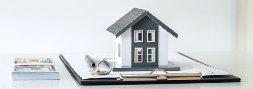 House on a clipboard with keys and a pile of money
