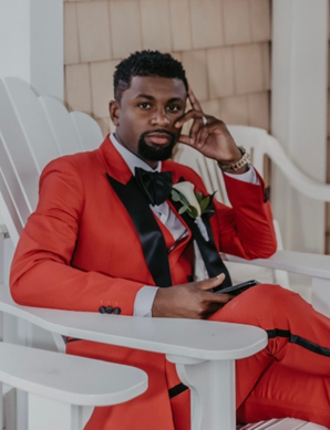 Nevin Hall, part-time administrative assistant sitting in a chair