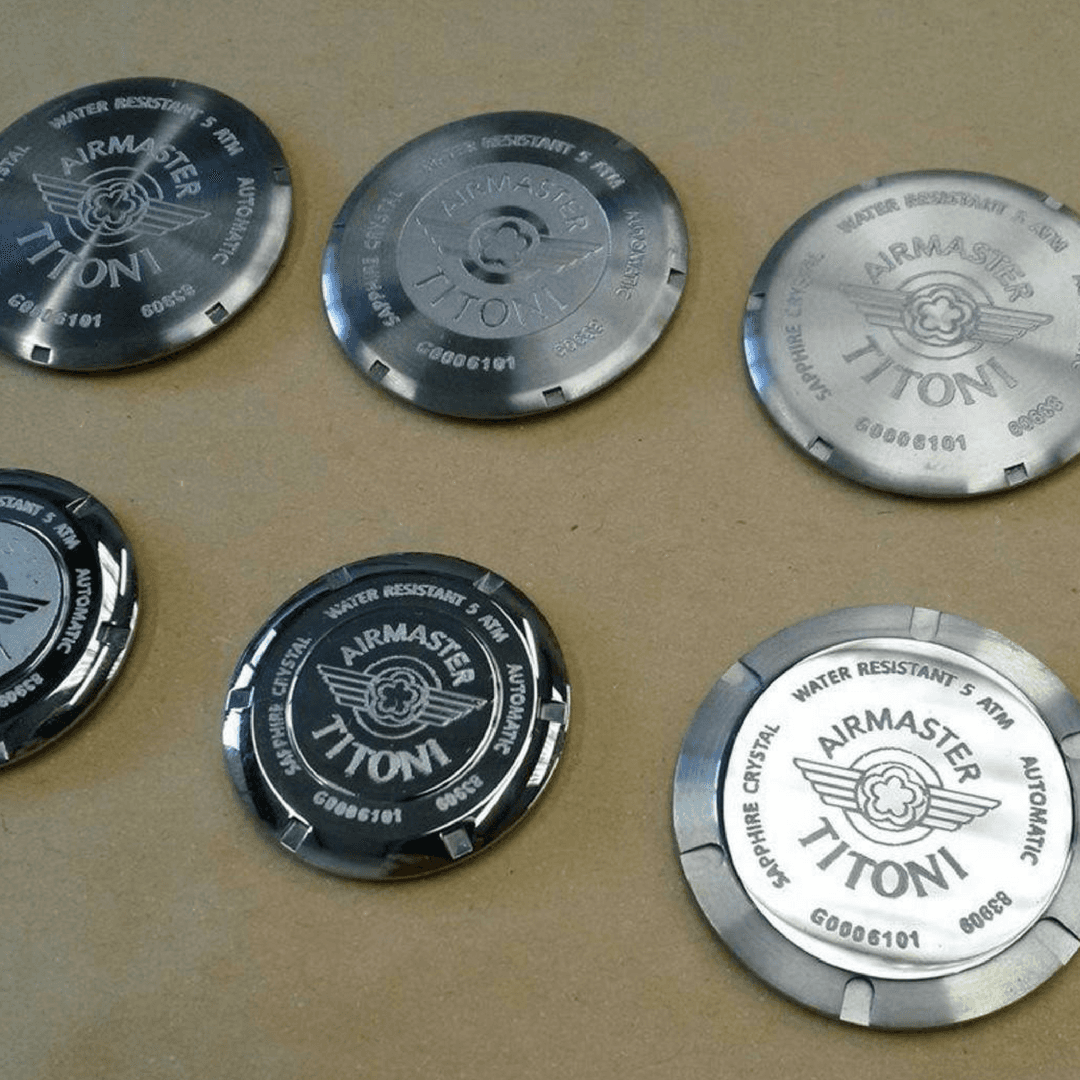 Chemical etched watch components using a laserable etch resist