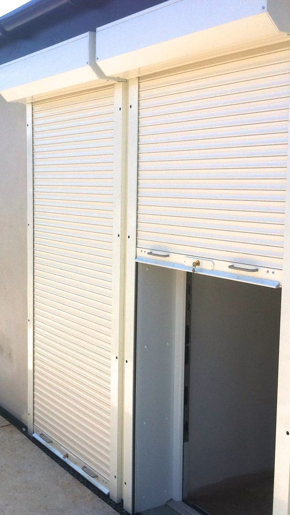 Commercial Manual Roller Shutters Installed by Cambridge Door Services Ltd