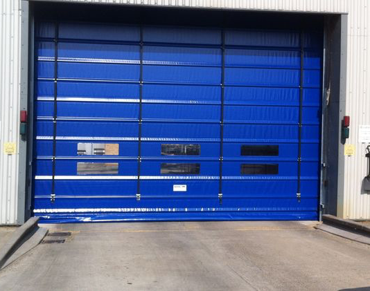 Blue Fold Door - Installed by Cambridge Door Services Ltd