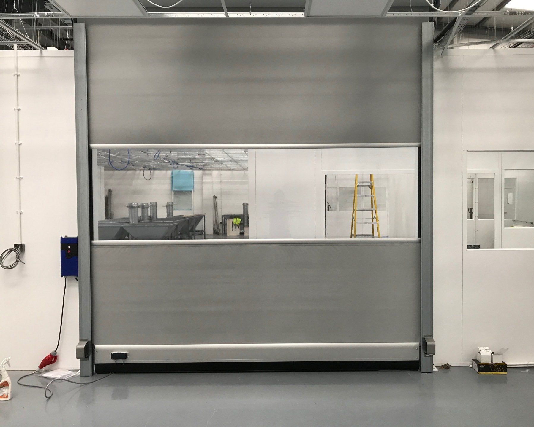 Grey Rapid Roll Door/Fast Action Door Installed by Cambridge Door Services Ltd