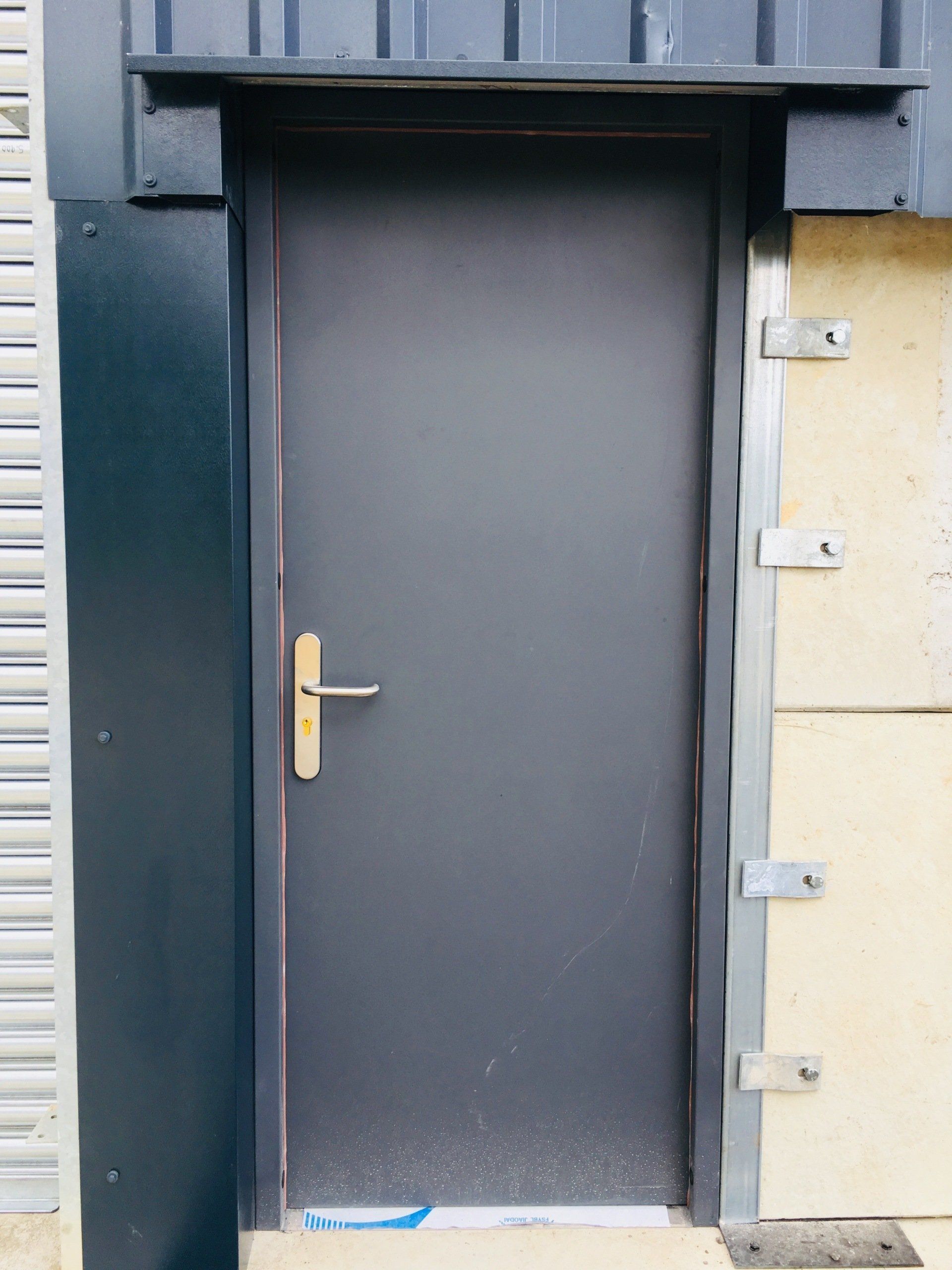Steel Personnel Door - Installed by Cambridge Door Services Ltd