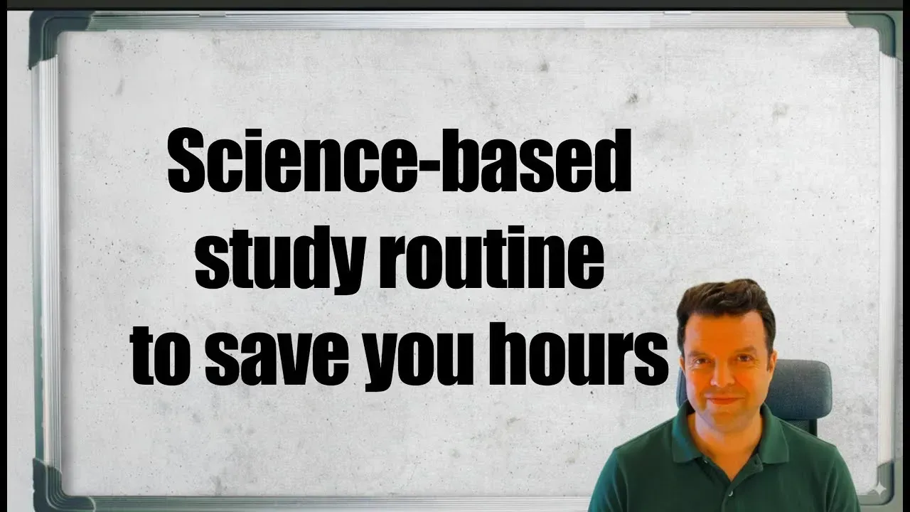 A man in a green polo shirt sits before a whiteboard with