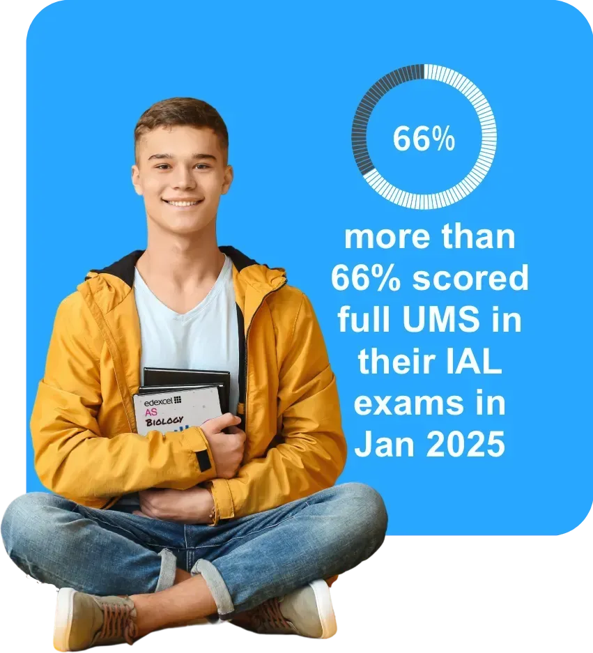 Smiling man in yellow holds a book by a blue panel: