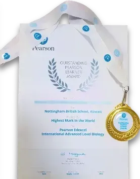 White certificate from Nottingham British School, Kuwait, for