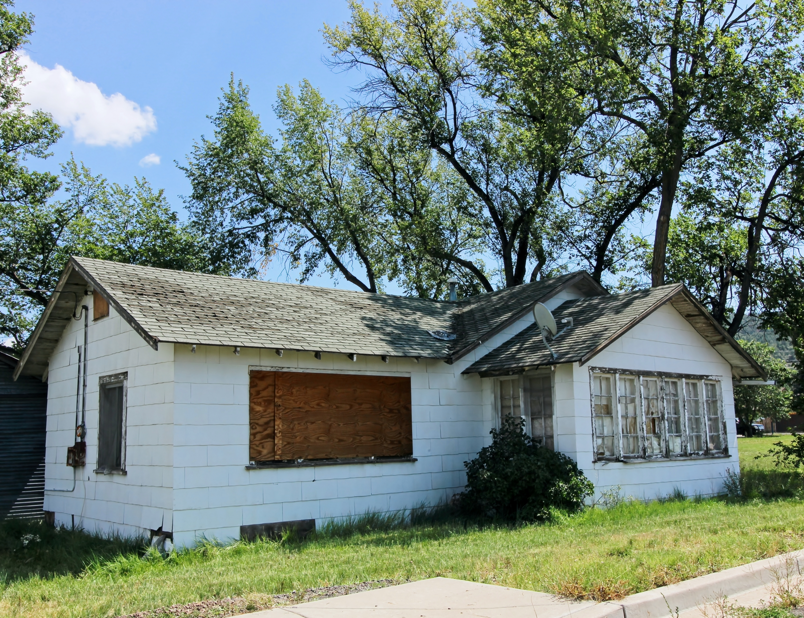 Window boarding services for foreclosure, REO, and bank-owned properties to prevent break-ins and protect assets