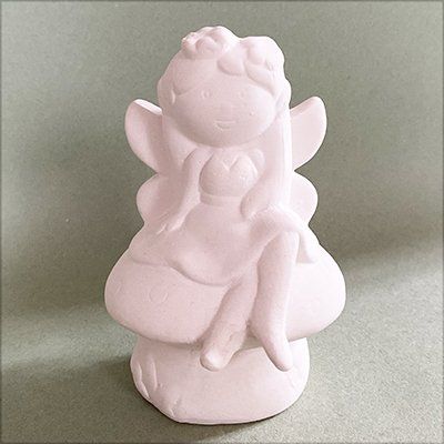 fairy on a toadstool